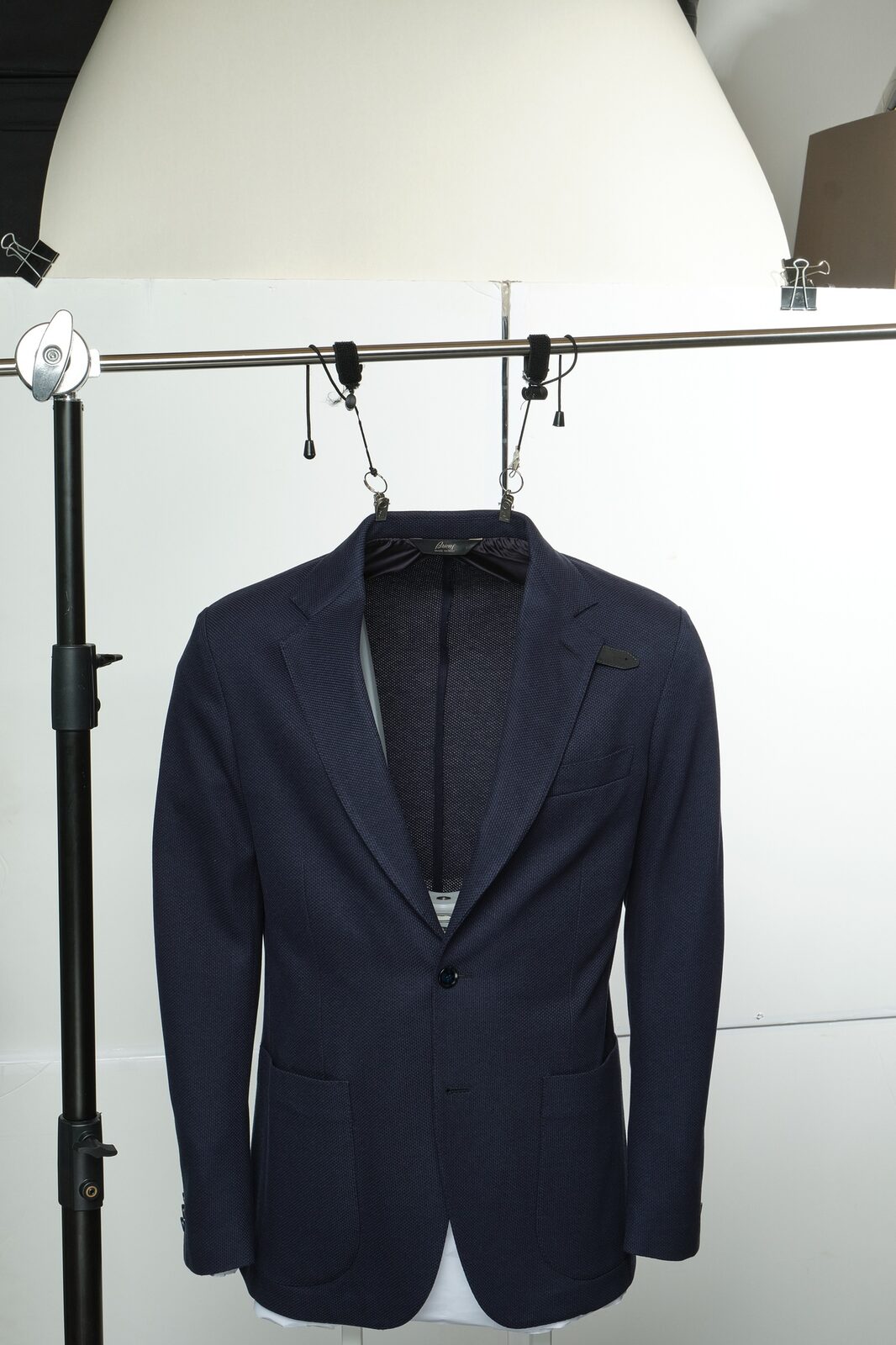 A jacket on a hanger, a campaign on the street — Lux Photo Pro